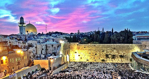 The Western Wall in Jerusalem, filled with Jewish pilgrims