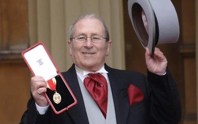 Playwright Sir Arnold Wesker holds his Knighthood, which he received from Britain's Queen Elizabeth II at Buckingham Palace, Wednesday February 22, 2006. See PA Story ROYAL Investiture. PRESS ASSOCAITION Photo. Photo credit should read: Stefan Rousseau/WPA Rota/PA.