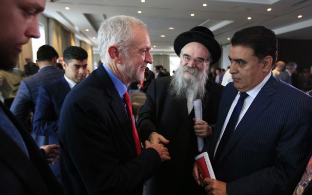 Jeremy Corbyn (left) meets with Rabbi Pinter (centre right) after delivering a speech on Labour's anti-Semitism inquiry findings 
