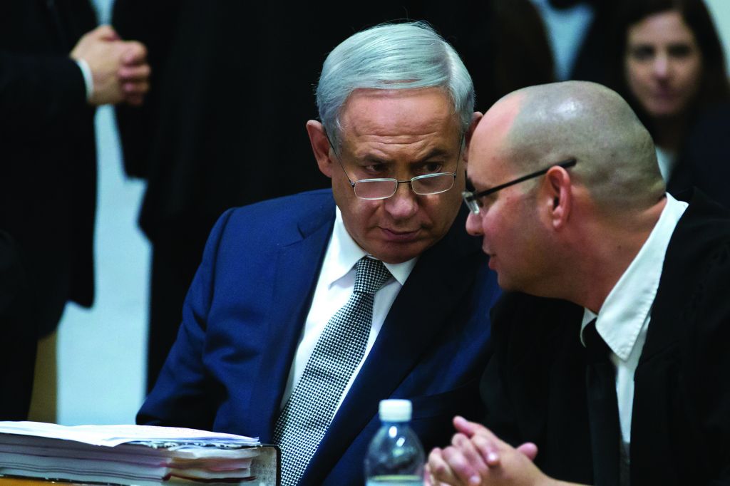 Benjamin Netanyahu with one of his lawyers at a Supreme Court hearing into a gas-drilling deal with the US