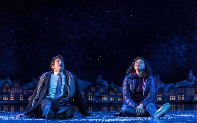 Andy Karl and co-star Carlyss Peer in a snowy scene from the show.