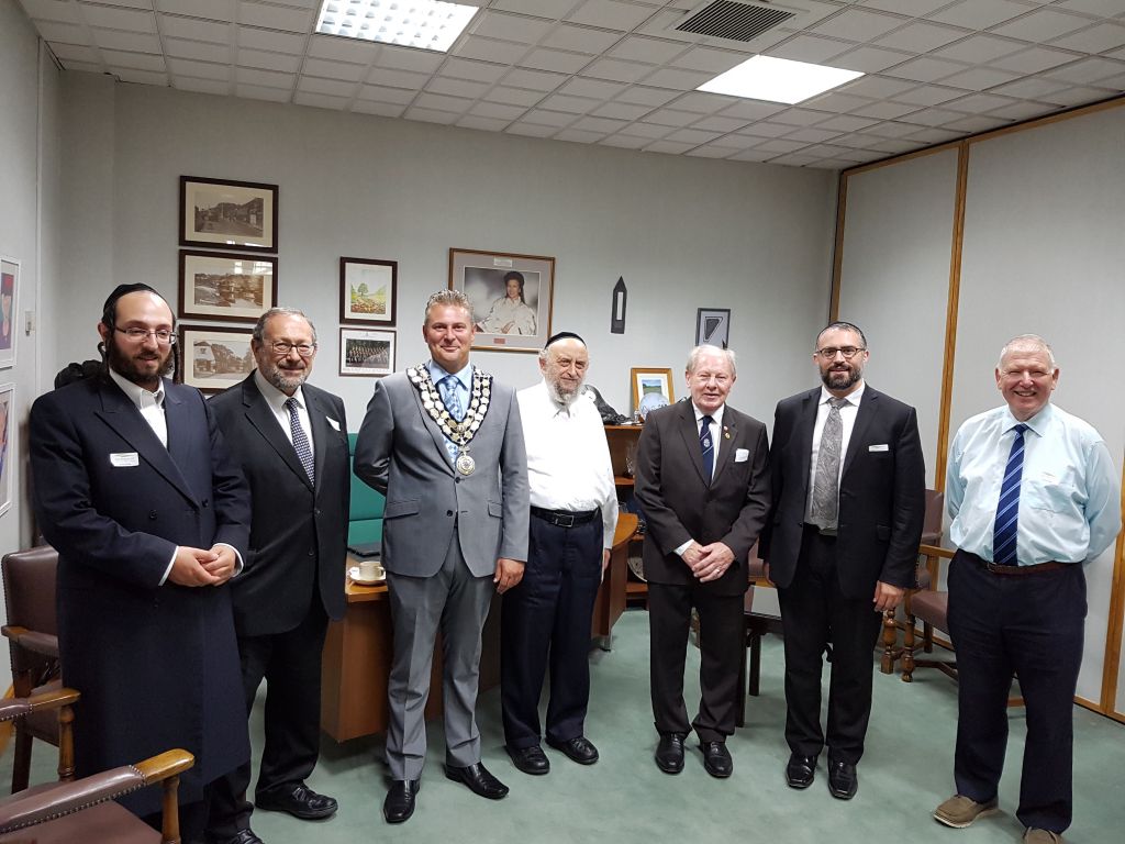 Representatives of the Jewish community of Canvey island invited to a mayor's reception at Castle Point council where they were presented with the Seal of the Council.