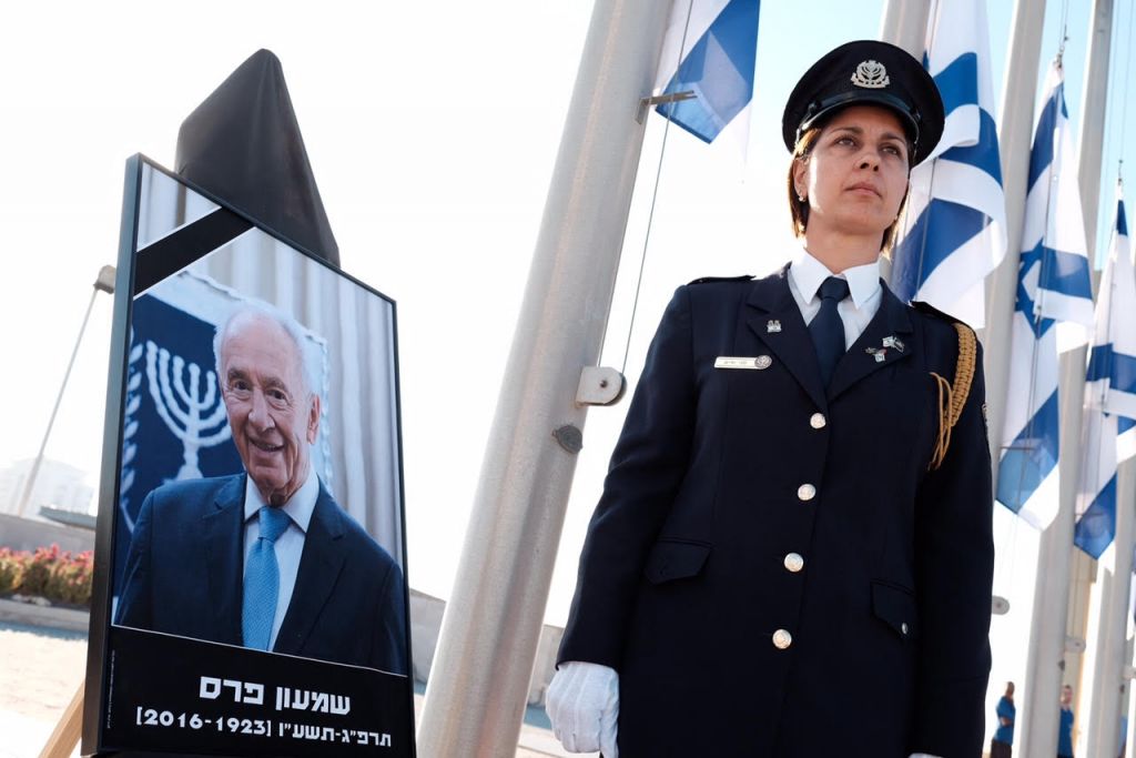 Peres' body is lying in state outside the Knesset