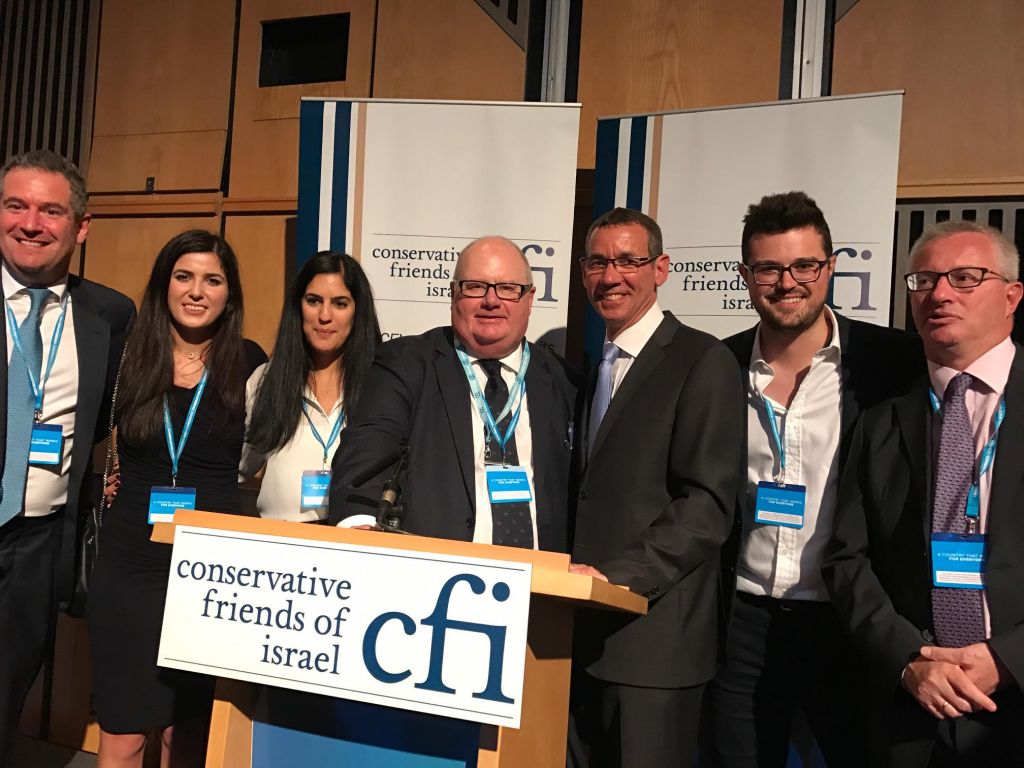 Sir Eric Pickles (centre) with israel's ambassador to the UK Mark Regev (to the right of Pickles) at the Conservative Friends of Israel event