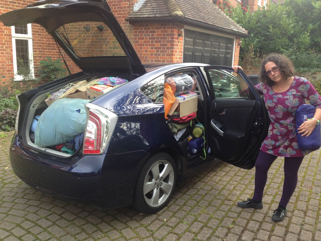 Holly Kal-Weiss with a car-full of undelivered aid 