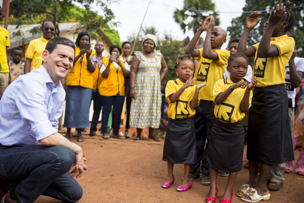 David Miliband is welcomed at the Kigoma transit center for Burundian and Congolese refugees in Tanzania. (Credit: IRC/Griff Tapper)