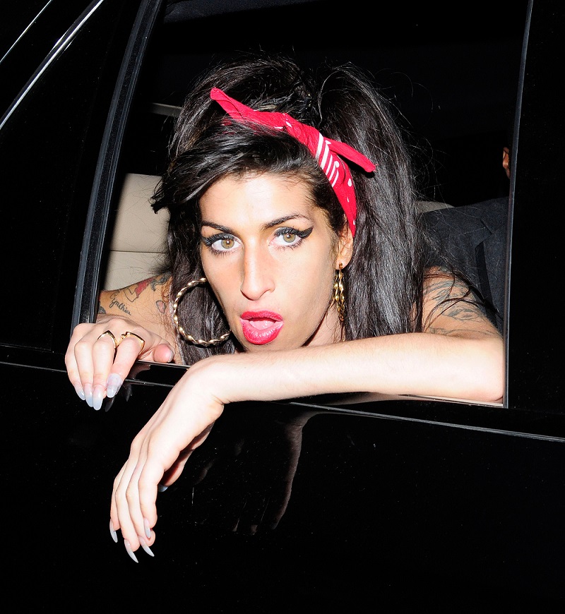 06.JULY.2010. LONDON AMY WINEHOUSE ARRIVING AT 100 CLUB, OXFORD STREET TO ATTEND MARK RONSON'S GIG. SHE THEN LEFT AT 11.30PM AND HEADED TO THE AFTERPARTY AT THE SANDERSON HOTEL WITH HER NIPPLE HANGING OUT WHERE SHE STAYED TILL 1.30AM AND LEFT LOOKING A LITTLE WORSE FOR WEAR BEFORE HEADING ONTO BUNGALO 8 CLUB WHERE SHE PARTIED TILL THE EARLY HOURS. BYLINE: OPTICPHOTOS.COM *THIS IMAGE IS STRICTLY FOR UK NEWSPAPERS AND MAGAZINES ONLY* *FOR WORLD WIDE SALES AND WEB USE PLEASE CONTACT OPTICPHOTOS - 0208 954 5968*