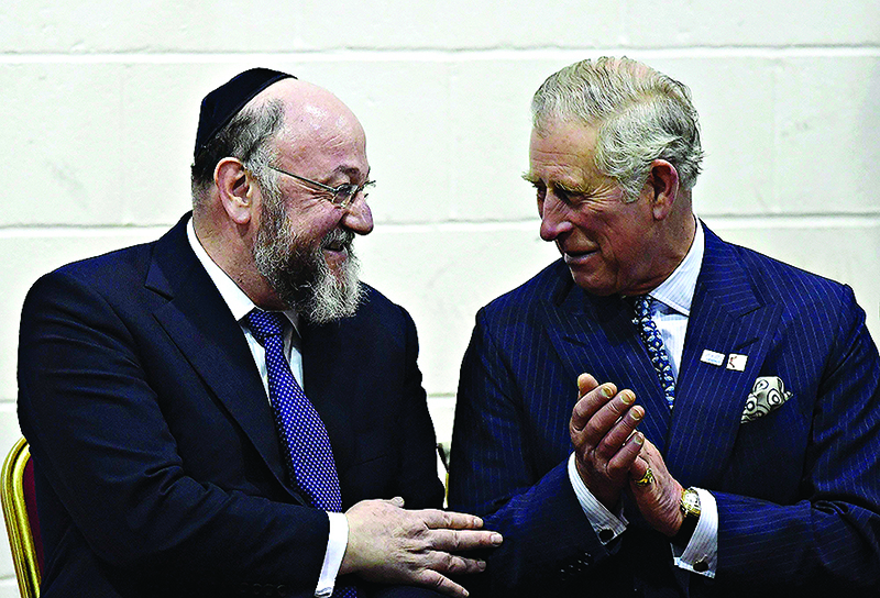The Prince of Wales (right) speaks with chief rabbi Ephraim Mirvis during a visit to Yavneh College, an Orthodox Jewish school in Borehamwood, Hertfordshire.
