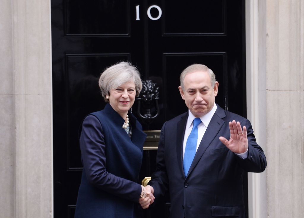 Prime Minister Theresa May greets Israeli Prime Minister Benjamin Netanyahu as he arrives in Downing Street, (Photo credit: Stefan Rousseau/PA Wire) 