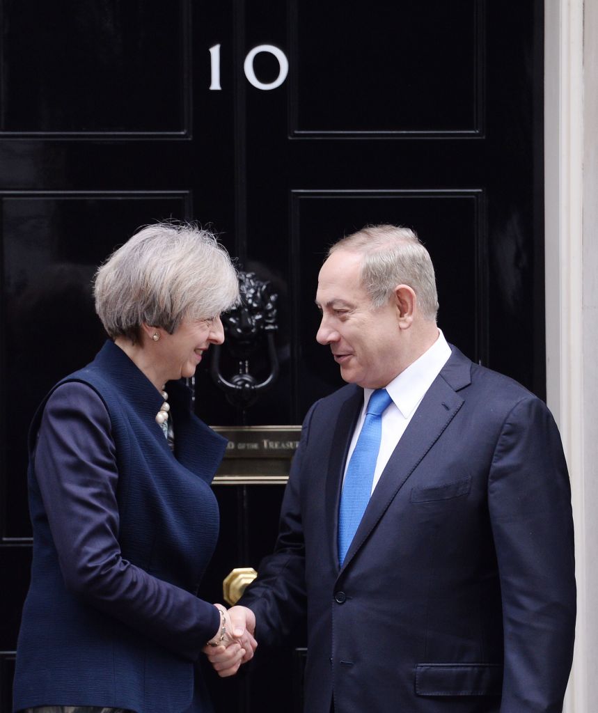 Prime Minister Theresa May greets Israeli Prime Minister Benjamin Netanyahu as he arrives in Downing Street, (Photo credit: Stefan Rousseau/PA Wire) 