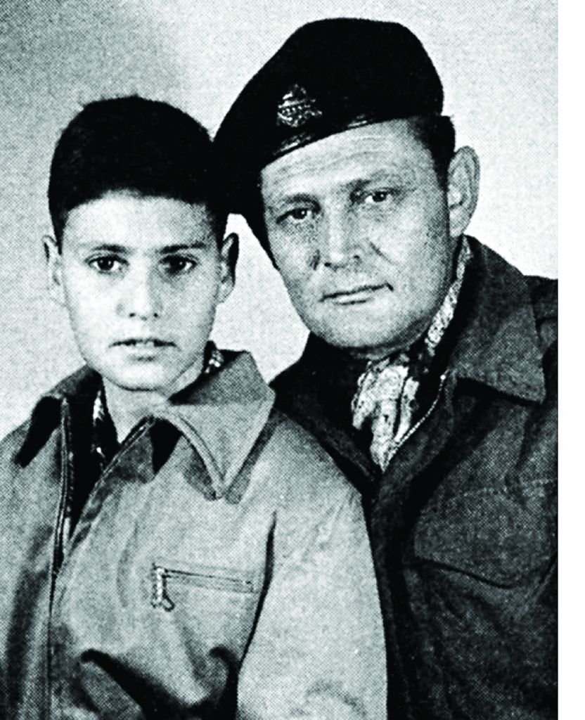 Uri aged 11 with his father, Tibor