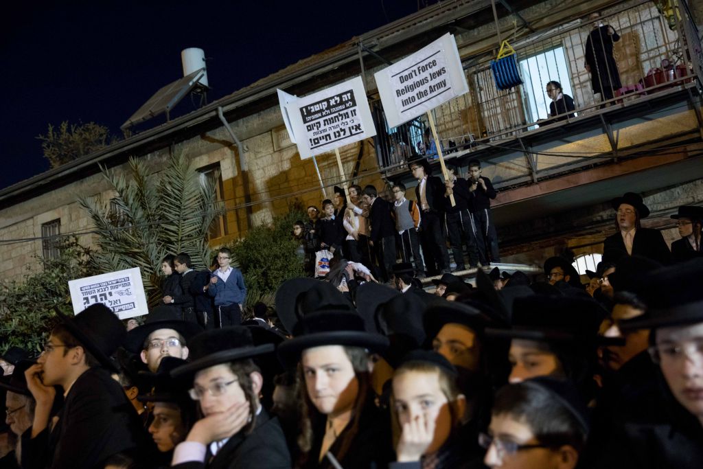 Thousands of ultra orthodox Jews protest the arrest of ultra-Orthodox draft dodgers, as they attend a rally against army recruitment in Jerusalem. (Photo by: JINIPIX) 