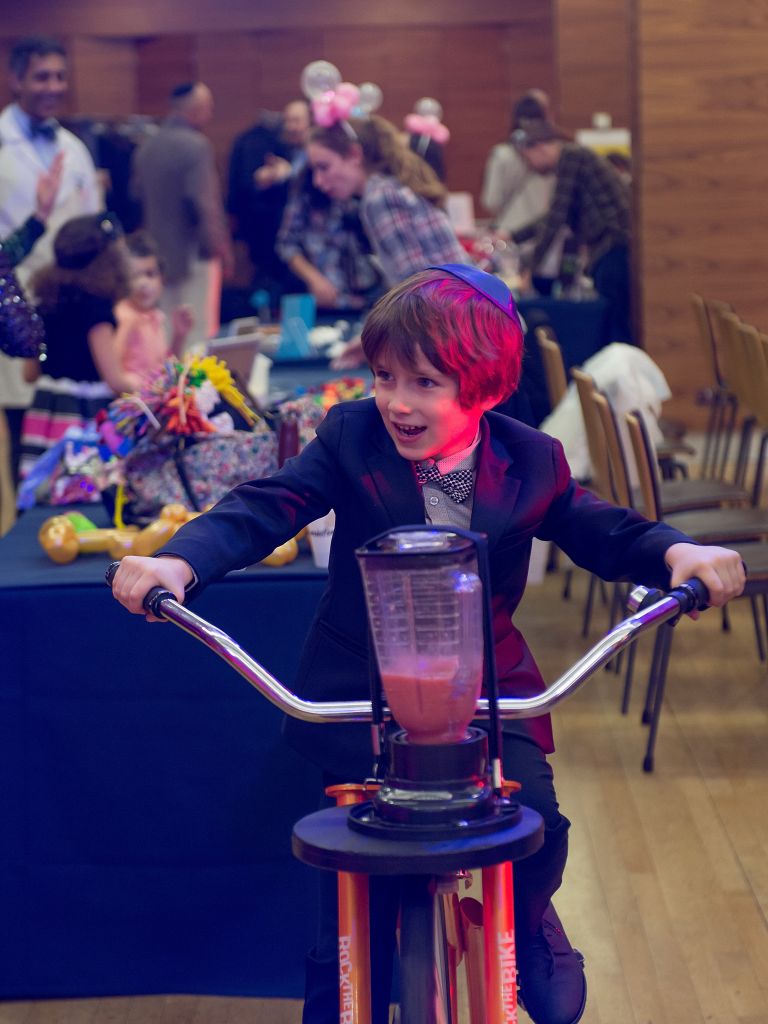 A child celebrating Chanukah at the Chabad centre of Belgravia 