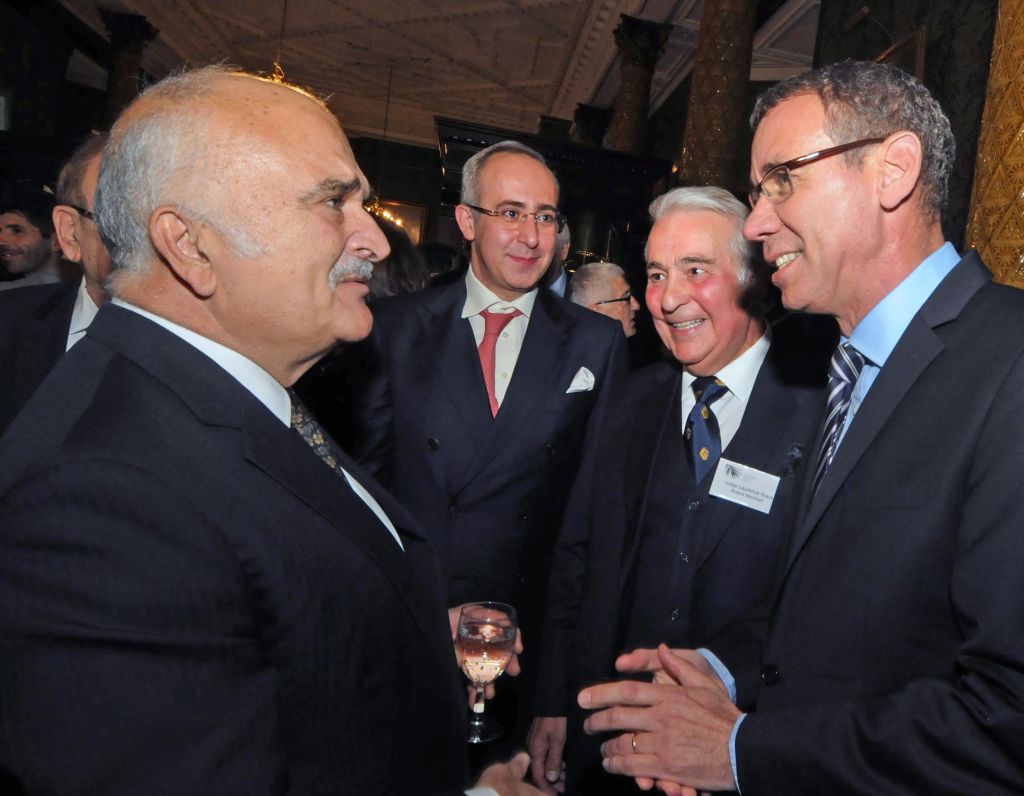 Prince El Hassan bin Talal (left) talking with Israeli Ambassador to the UK Mark Regev (right) Photo credit: John Rifkin