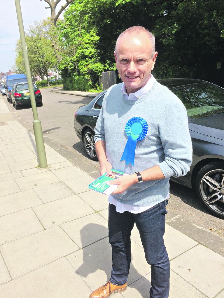 Mike Freer on the campaign trail 