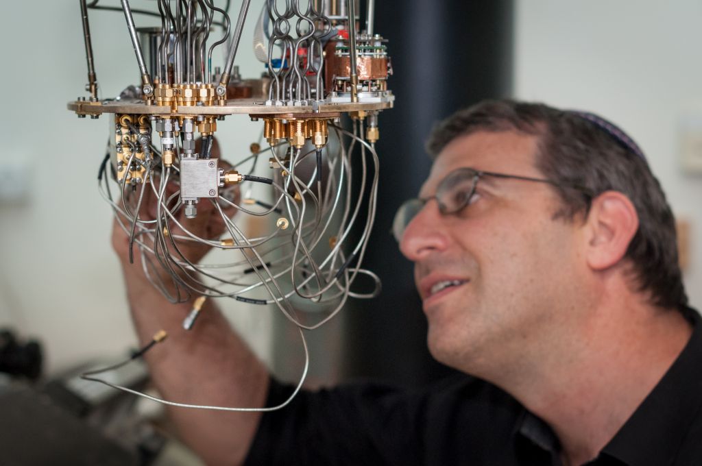 Prof. Nadav Katz with a low temperature setup for testing superconducting detectors at the Hebrew University's Quantum Information Science Center. (Credit: Yitz Woolf for Hebrew University) 