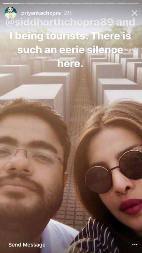 Priyanka Chopra and her brother posing for a Shoah memorial selfie 