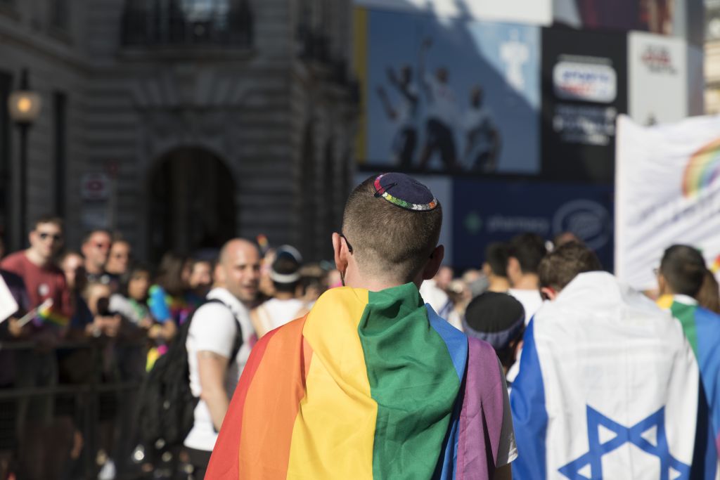 Pride participants wore Jewish Rainbow flags, whilst others brought Israeli flags Credit - Gilad Visotsky