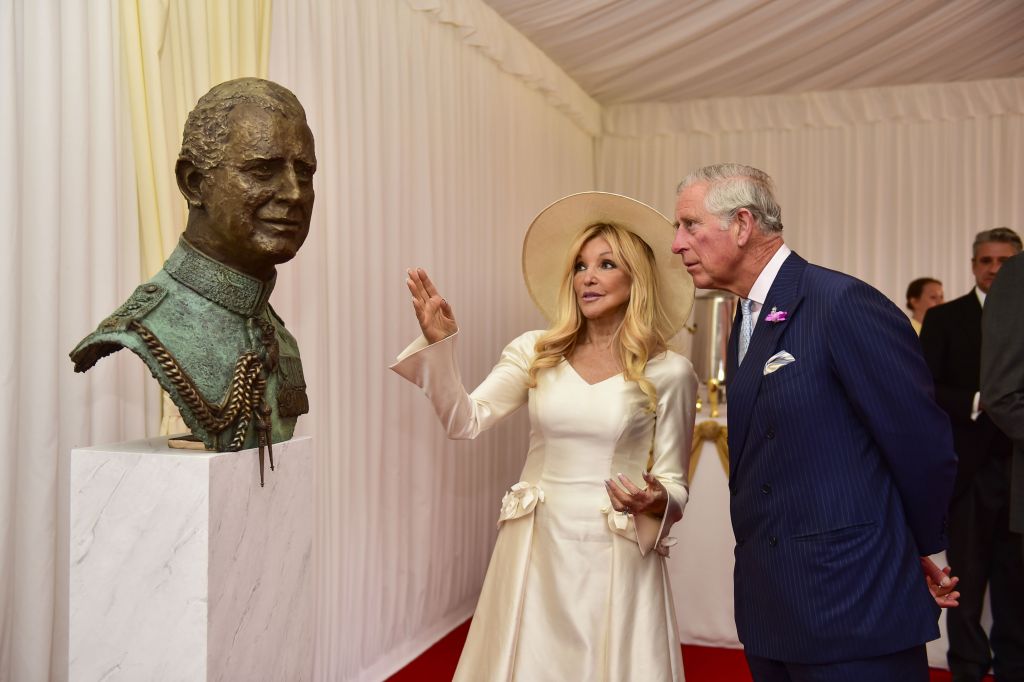 Frances Segelman with HRH Prince Charles, and her sculpture of the heir to the throne 