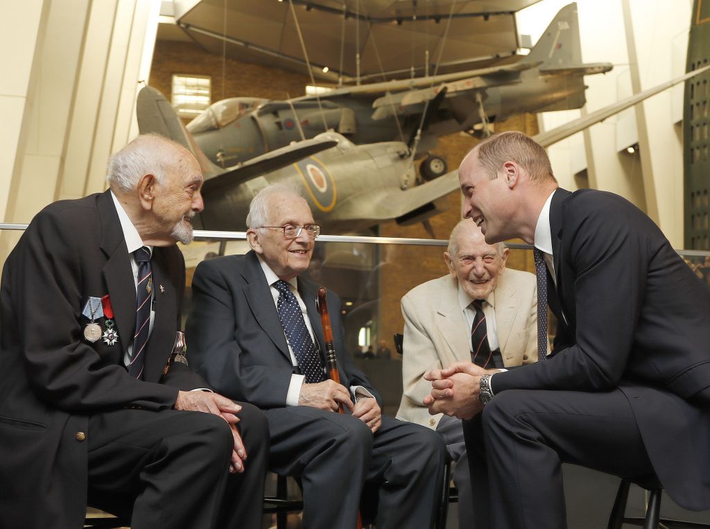 The Duke of Cambridge (right) meets Freddie Knoller (second left), as well as two veterans of World War II, Ted Cordery (left) and John Harrison during a visit to the Imperial War Museum in London.  Photo credit: Frank Augstein/PA Wire 