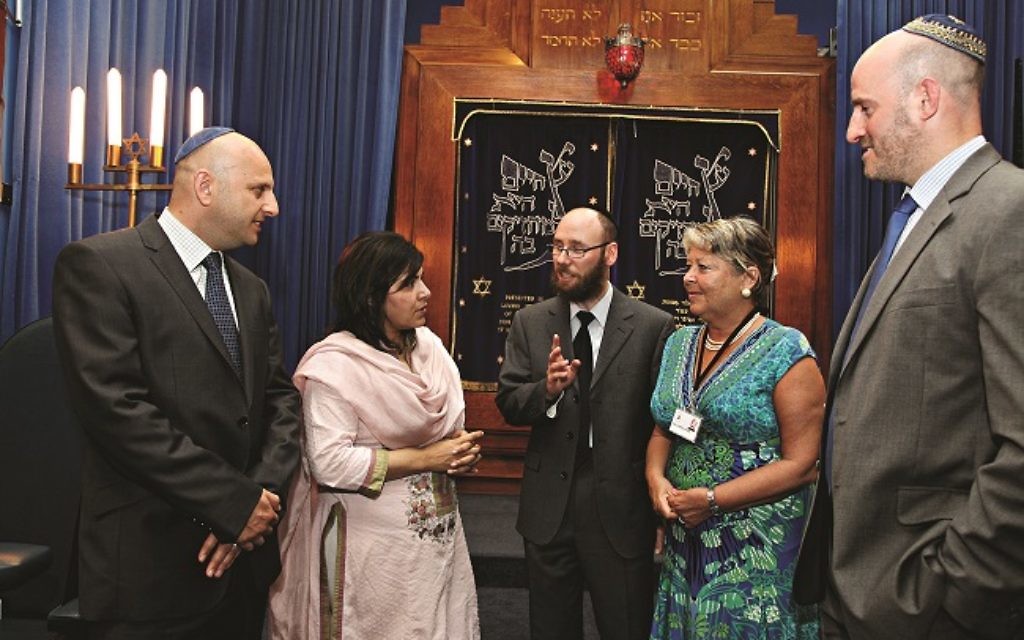 Baroness Warsi (second from left) meeting community and local leaders at Brondesbury synagogue last July.