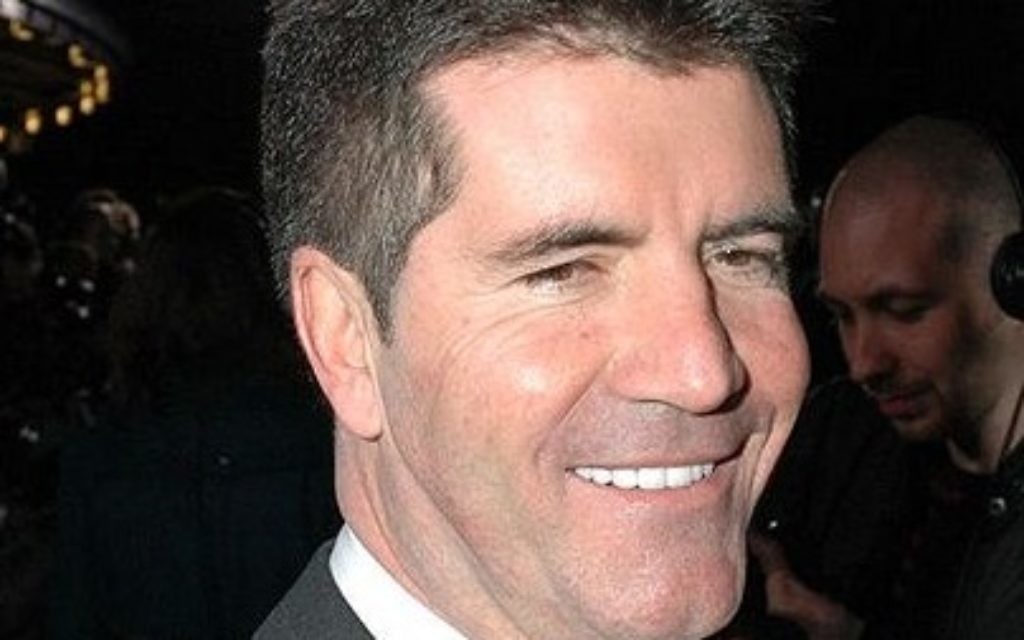 Simon Cowell is set to become a dad for the first time early next year.