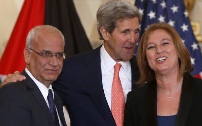 Secretary of State John Kerry stands with Israel's Justice Minister and chief negotiator Tzipi Livni, right, and Palestinian chief negotiator Saeb Erekat at the State Department in Washington.