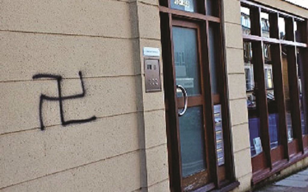 Swastika graffiti on a wall on Finchley
