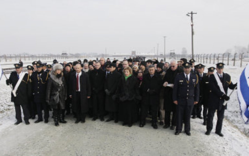 Members of Israeli parliament, the Knesset, attend a ceremony to mark the 69th anniversary of the liberation of Auschwitz Nazi death camp's in Oswiecim, Poland, on Monday.