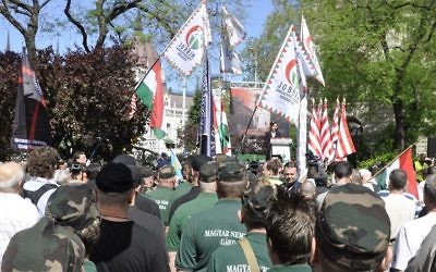 Members of the New Hungarian Guard stand at a Jobbik rally against a gathering of the World Jewish Congress in Budapest, 4 May 2013

Source: Wikimedia Commons. Credit: Michael Thaidigsmann