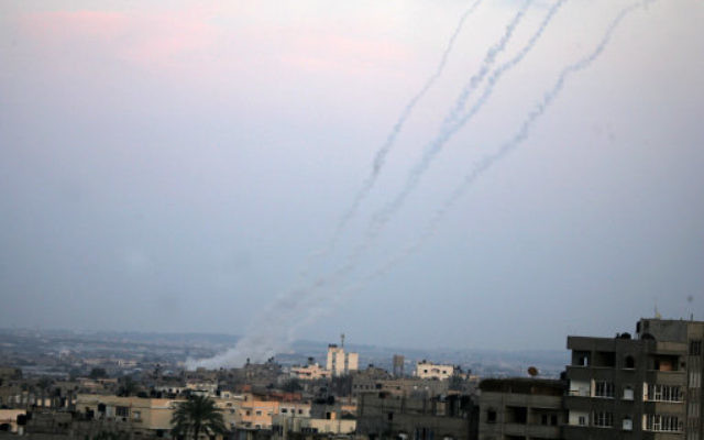 Smoke trails are seen after Hamas rockets are fired in the southern Gaza Strip towards southern Israel, in 2012.