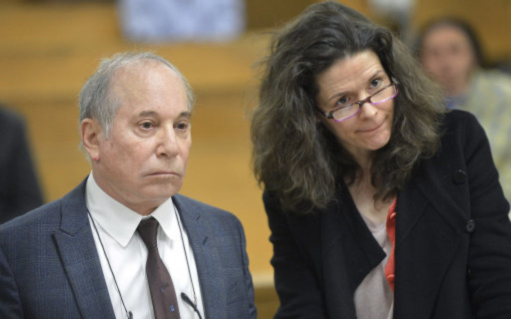 Singer Paul Simon, left, and his wife Edie Brickell.