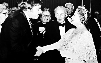 Bob Sherman meeting Queen Elizabeth, the Queen Mother at the Royal Command Film performance of The Slipper and the Rose (1976)