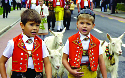 Appenzeller boys in traditional dress take part in a pageant in Herisau, Switzerland