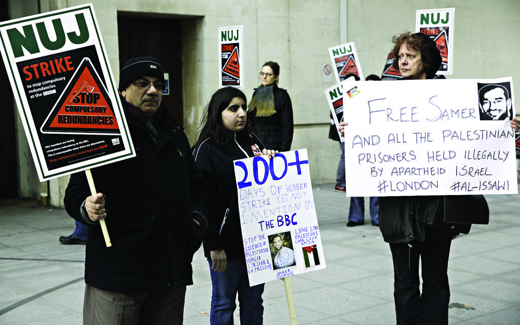 Protesters gathered outside the BBC in 2013 holding placards in protest against the keeping of Palestinian prisoners in Israeli jails
