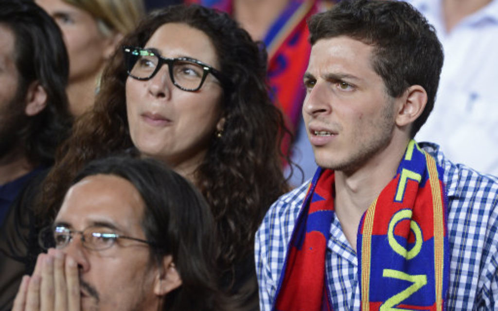 Gilad Shalit, right, is pictured during a Spanish La Liga soccer match between FC Barcelona and Real Madrid at the Camp Nou stadium in Barcelona. (AP)