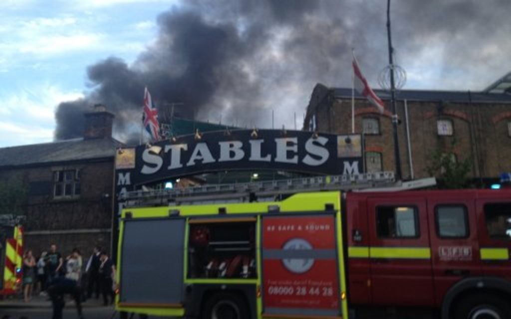 Smoke rises from the Stables Market area of Camden Town.