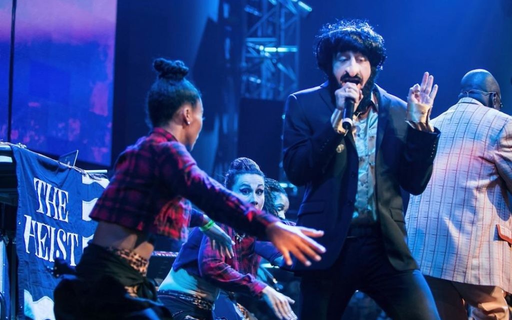 Macklemore dressed up as an Orthodox Jew, wearing a massive prosthetic nose at a Seattle show – not during the current tour with Ed Sheeran.
