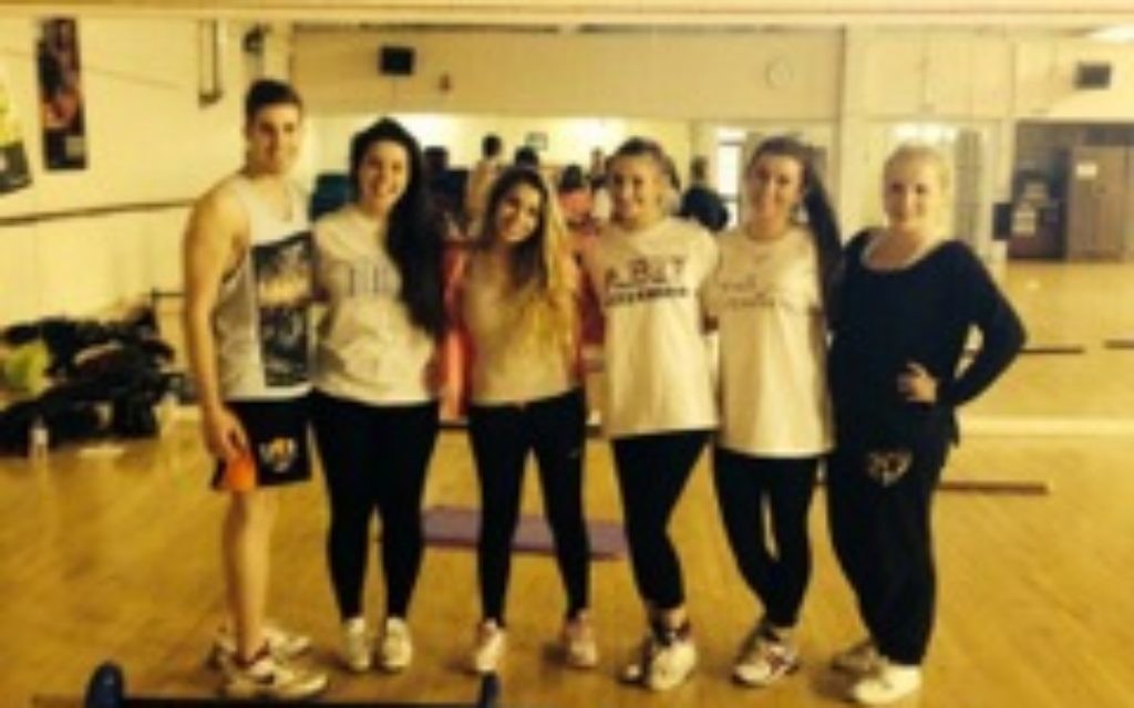 Birmingham J-Soc girls after being put through their paces at a bums, legs and tums class last year.