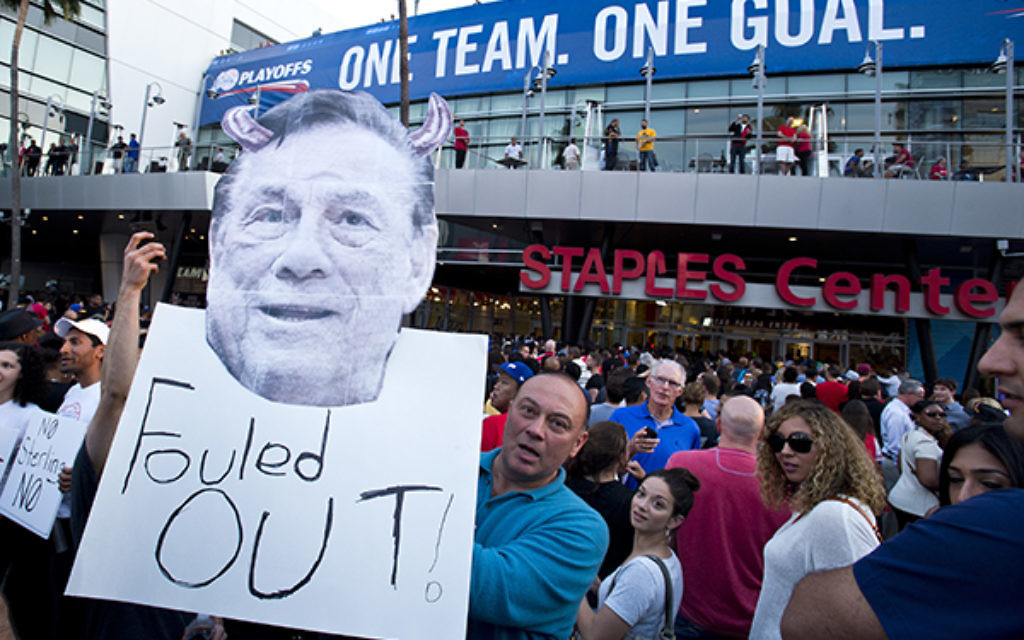 Basketball fans protest against racist comments made by LA Clippers owner Donald Sterling in Los Angeles. Photo: Lionel Hahn