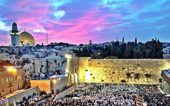 The Western Wall in Jerusalem, filled with Jewish pilgrims The Western Wall in Jerusalem, filled with Jewish pilgrims