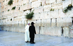 The Pope prays at the Western Wall