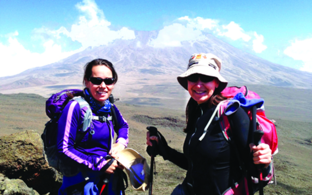 Alex Maurice and Ruth Bray climbing Mount Kilamanjaro