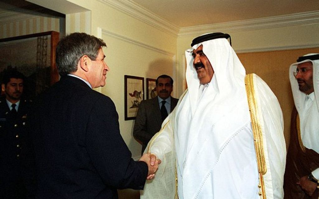 Former Emir of Qatar Hamad bin Khalifa Al-Thani meets former US Deputy Secretary of Defense Paul Wolfowitz. In 2013 Hamad handed power over to his son, Tamim.