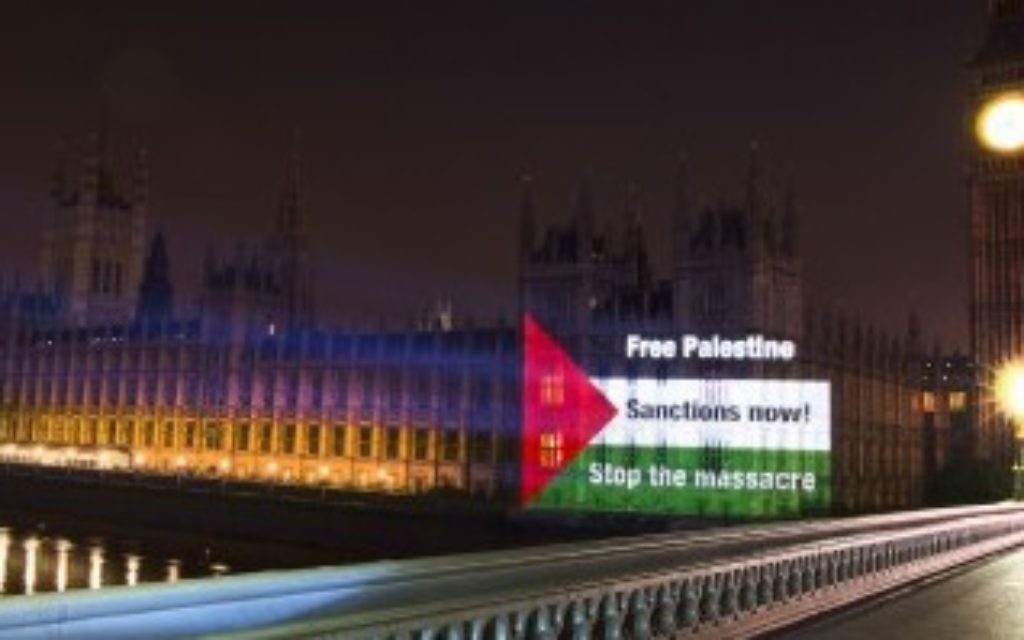 The Palestine Solidarity Campaign project an image onto the Houses of Parliament.