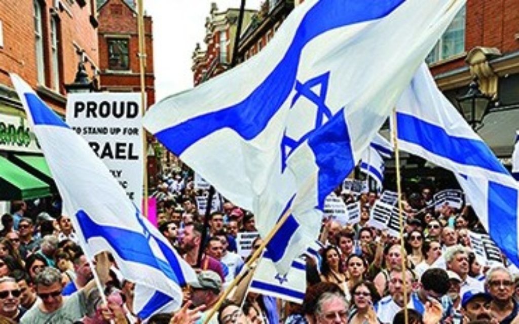 Hundreds of British Jews show their pride in Judaism and Israel at a rally in Kensington earlier this year.