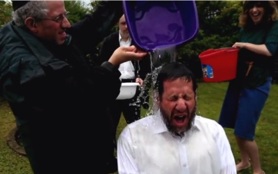 Rabbi Schochet completing the ice bucket challenge
