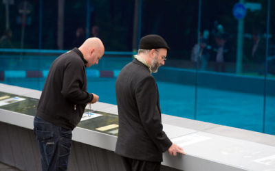 Visitors view the monument for the victims of the Nazi Euthanasia Program (Action T4) in Berlin.