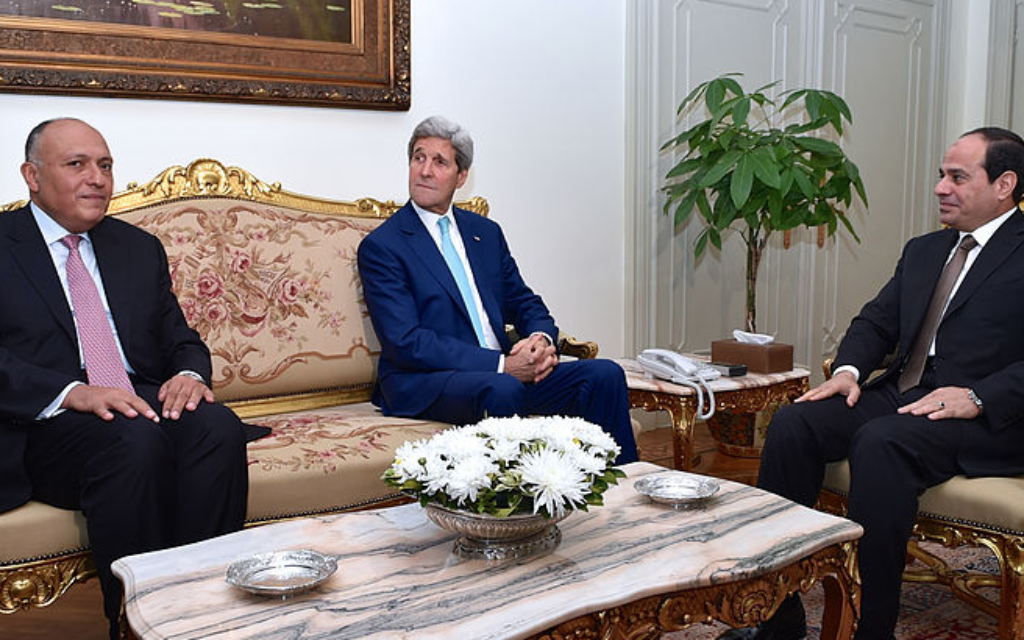 Egyptian President Abdel Fattah al-Sisi meets with U.S. Secretary of State John Kerry and Egyptian Foreign Minister Sameh Shoukry at the Presidential Palace in Cairo on July 22 to discuss a ceasefire in Gaza.