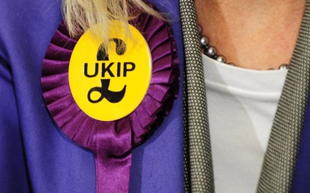 A UKIP candidate with a rosette